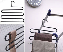 Multi-layer S-shaped metal pants hangers for space-saving closet organization.