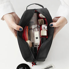 Black embroidered cosmetic travel pouch organizer bag for daily essentials.