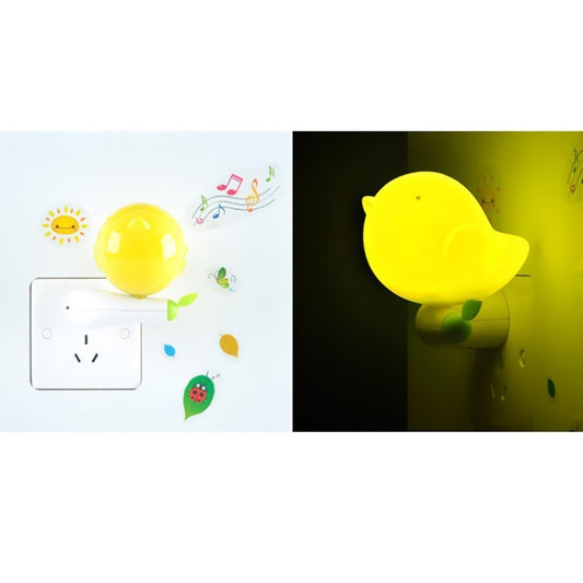 Cute yellow bird plug-in LED night light for bedside illumination.