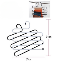 Multi-layer S-shaped metal pants hangers for space-saving closet organization.