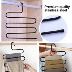 Multi-layer S-shaped metal pants hangers for space-saving closet organization.